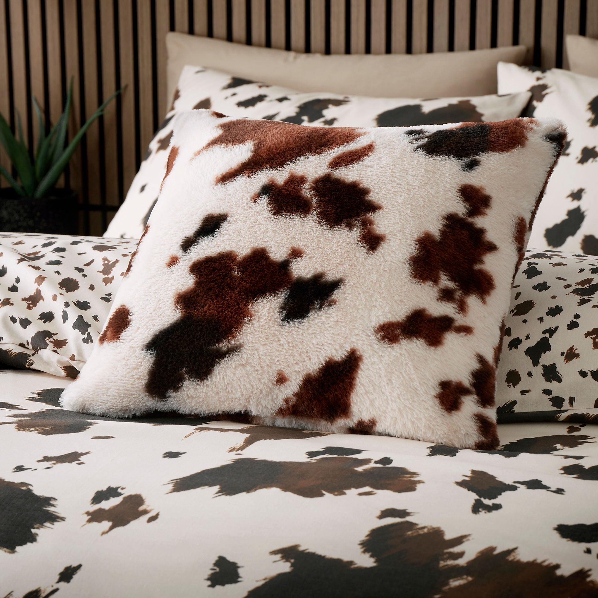 Cow Print Faux Fur Cushion in Natural 43 x 43cm