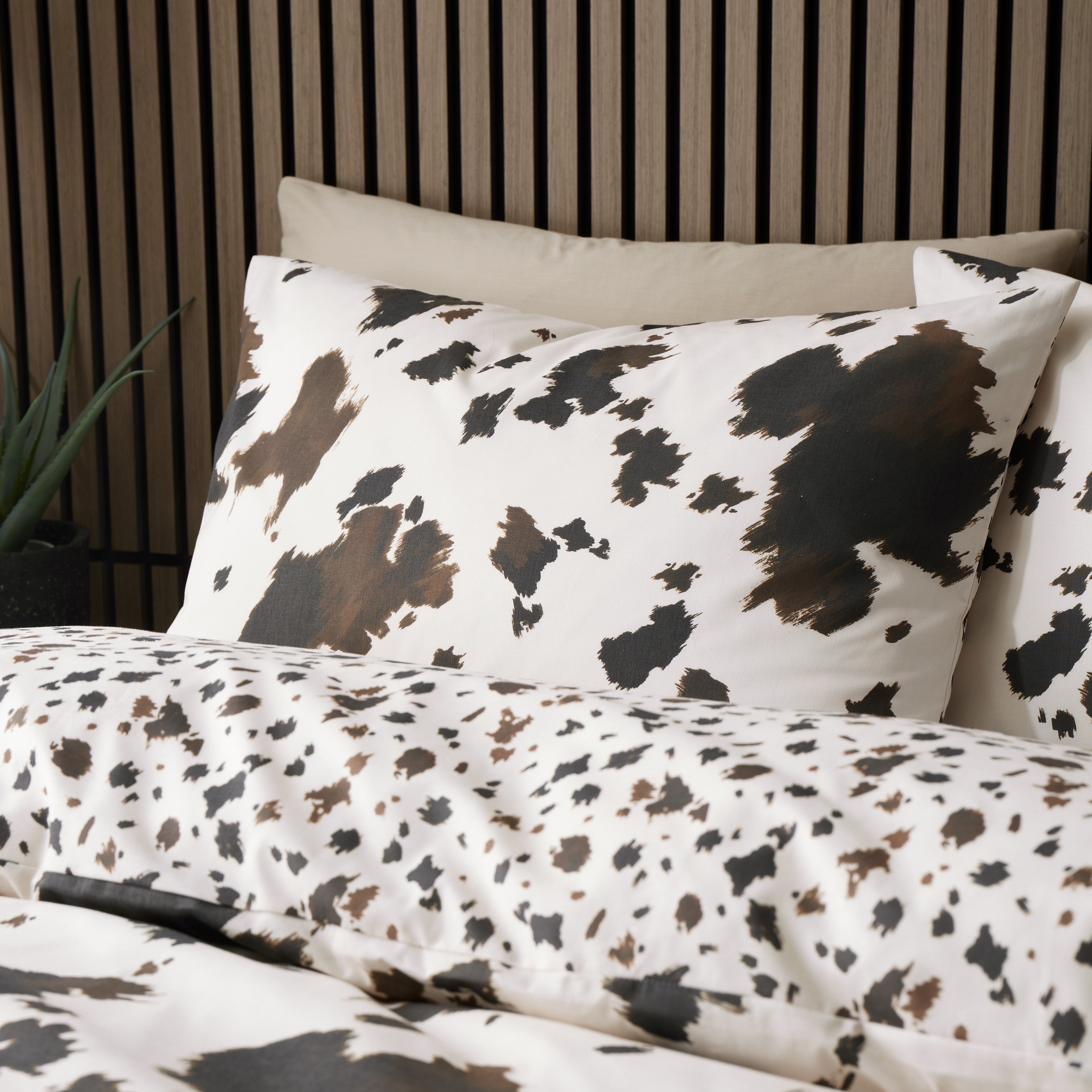 Cow Print Faux Fur Cushion in Natural 43 x 43cm